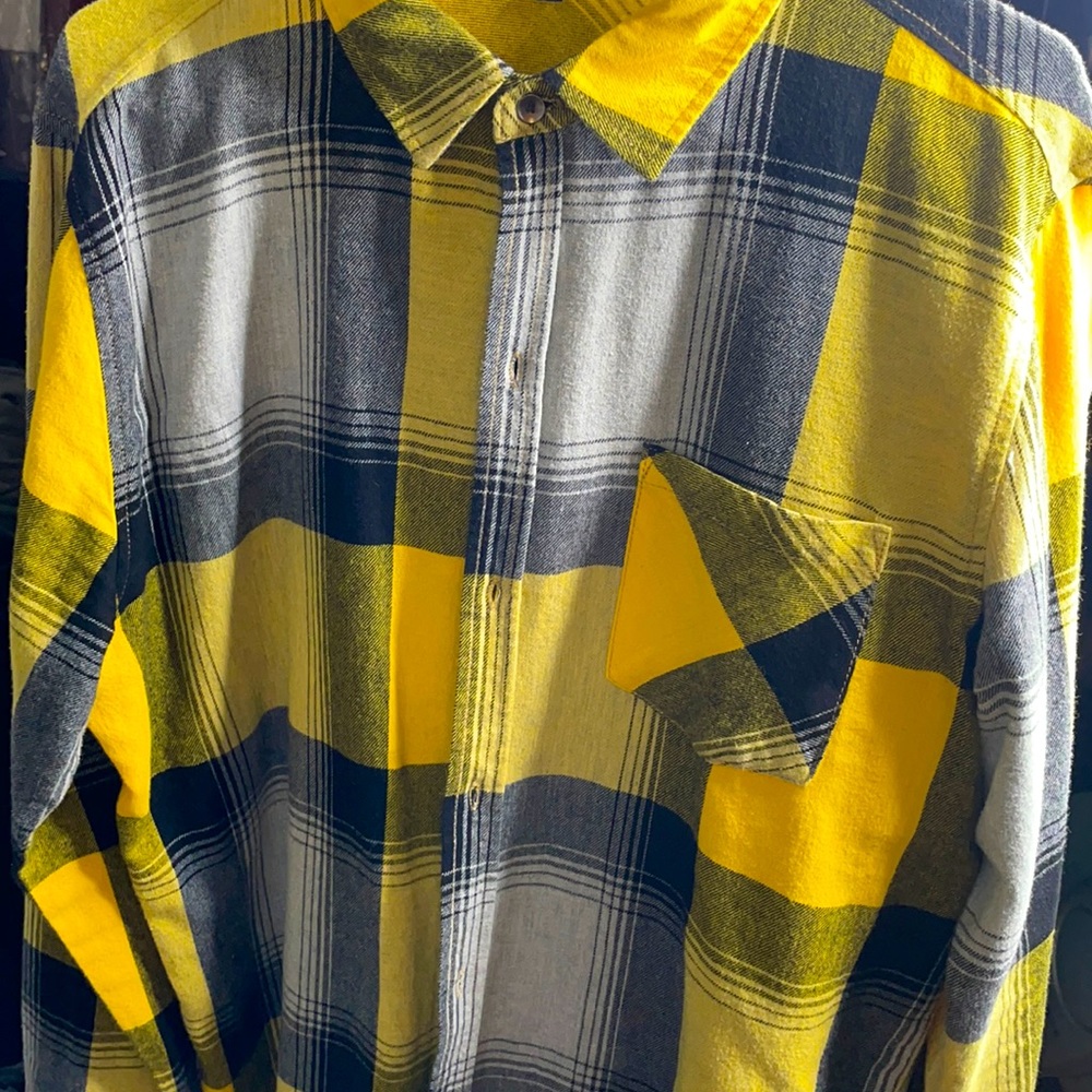 Yellow and black long sleeve button up.